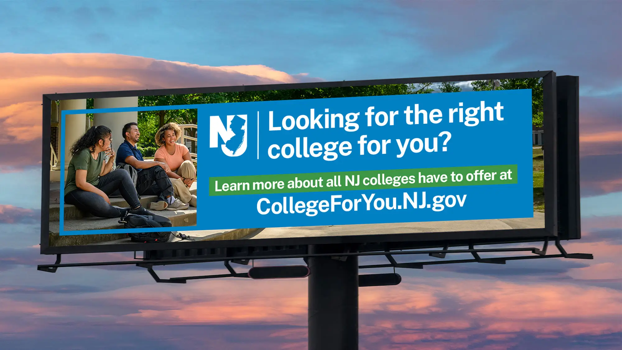 A billboard of a group of college students sitting on the steps of a university building.