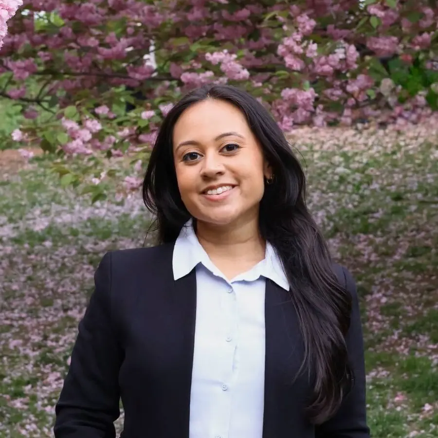 Headshot photograph of Amani Farooque