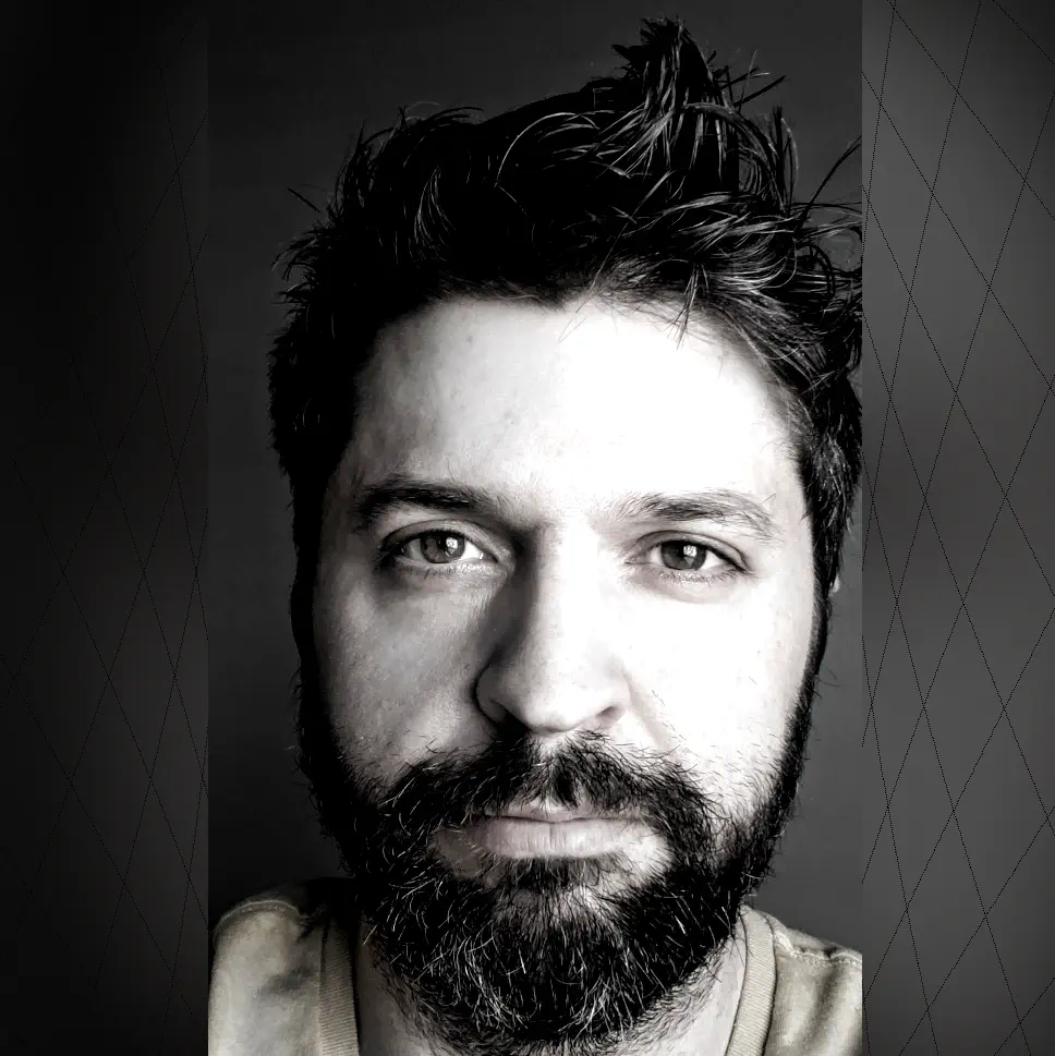 Headshot photograph of Marc Santosusso