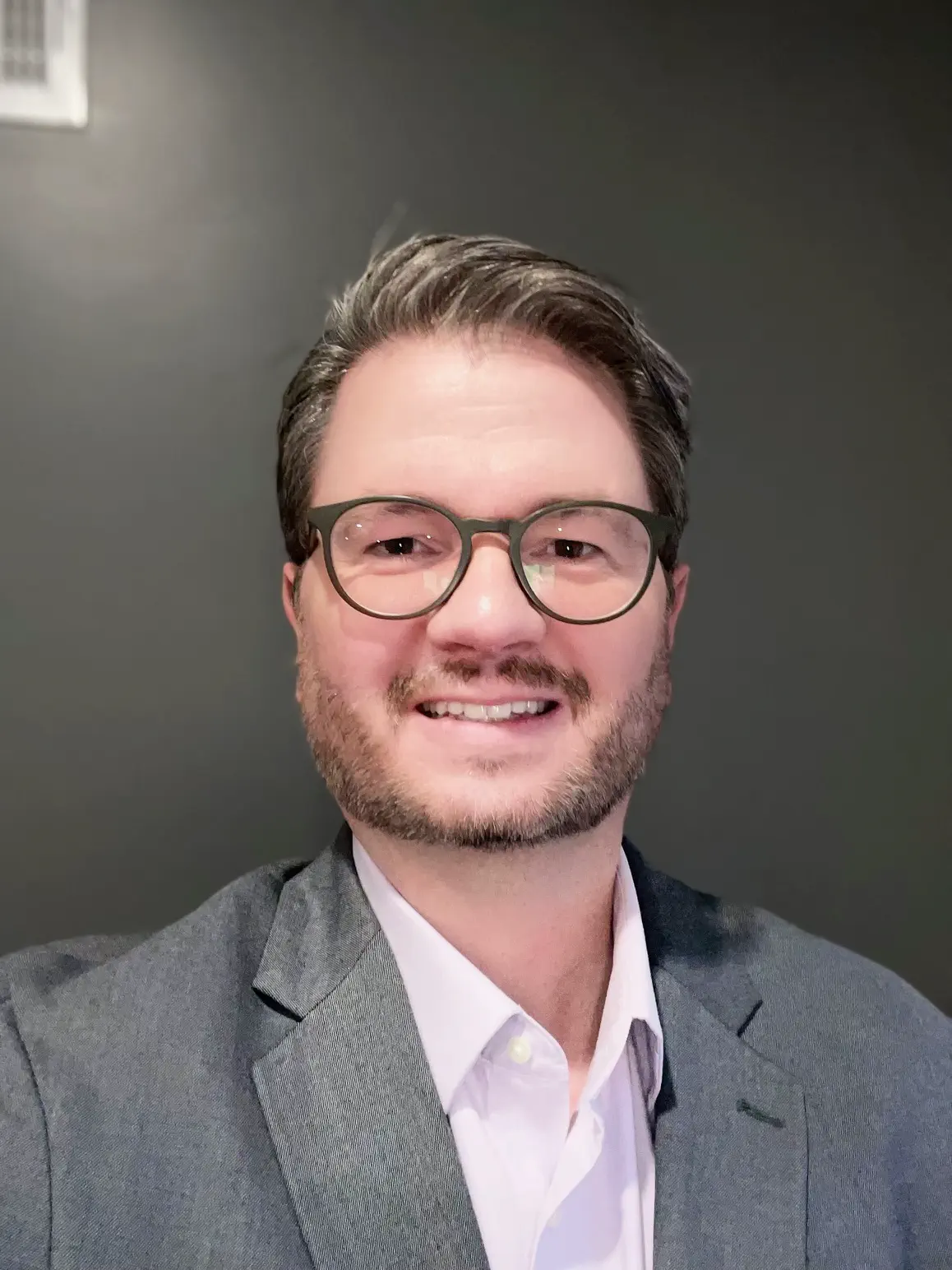Headshot photograph of Nathan Osburn