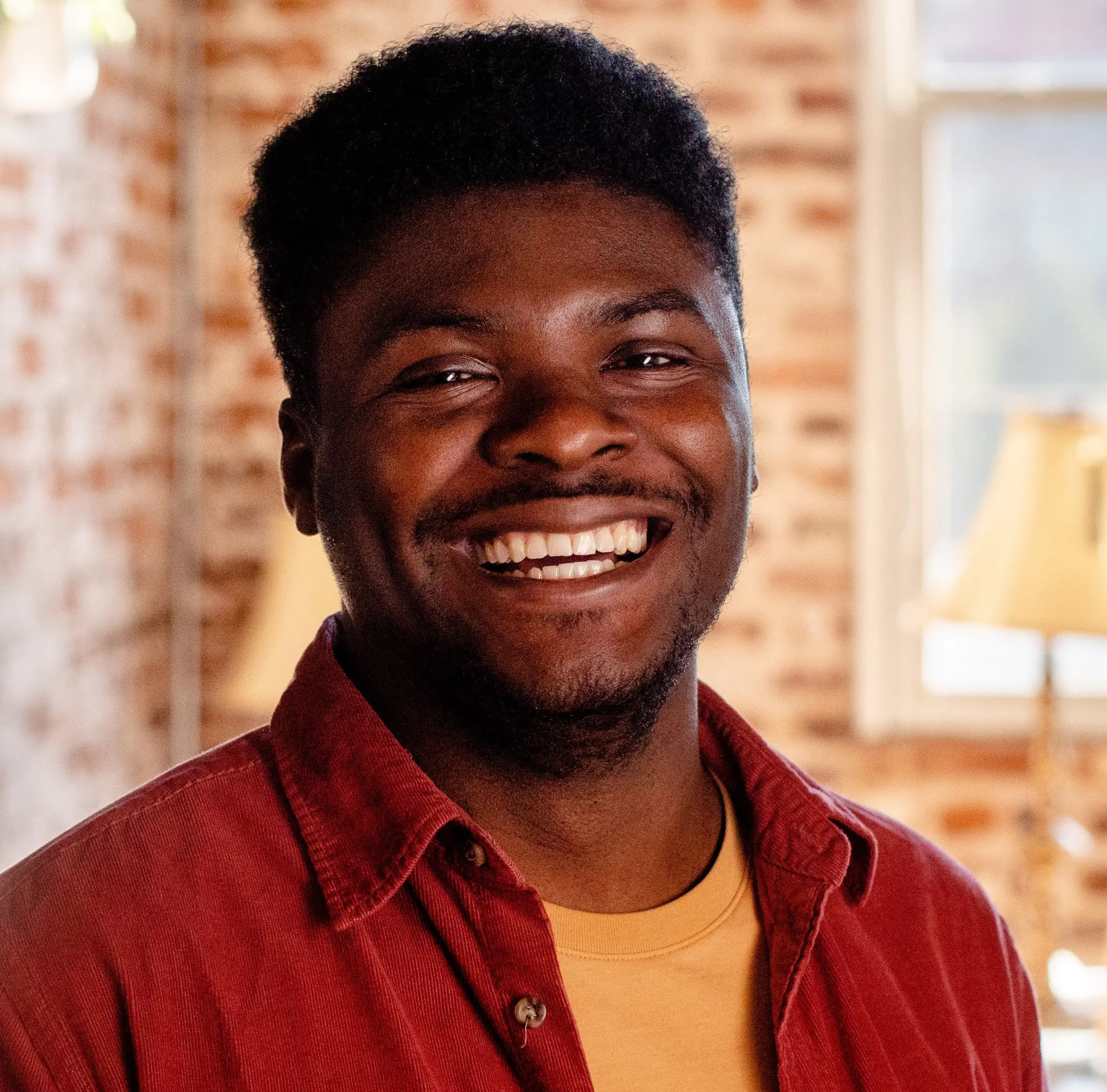 Headshot photograph of Oreofe Aderibigbe